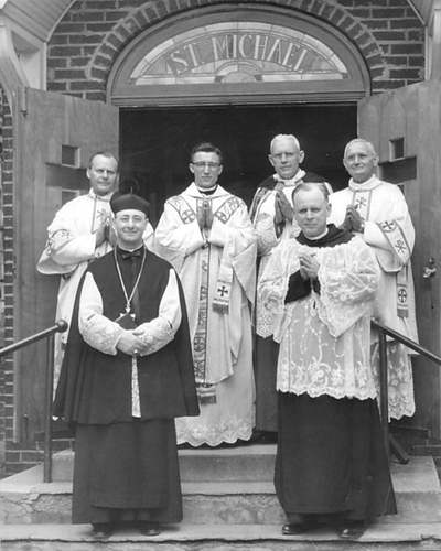 Fr. Stephen Uhl (back row, second from left), in Bradford, Ind., on the day he celebrated his first Mass. He was a Catholic priest for 11 years, but first became a Benedictine monk during 12 years of seminary training.