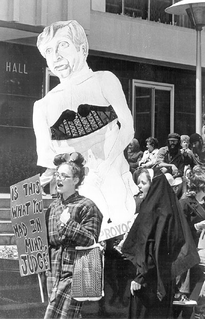 Annie Laurie pickets Dane County (WI) Judge Archie Simonson