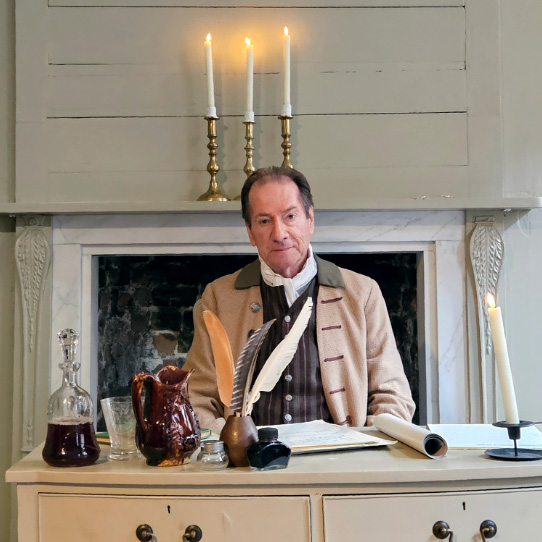 a gentleman costumed to look like Thomas Paine